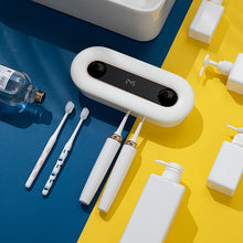 Load image into Gallery viewer, Toothbrush Sanitizer Holder, Sterilizer for All Toothbrushes, Wall Mount Sticker Plus Toothpaste Dispenser, Wireless and Long Battery Life for Family Bathroom Kids
